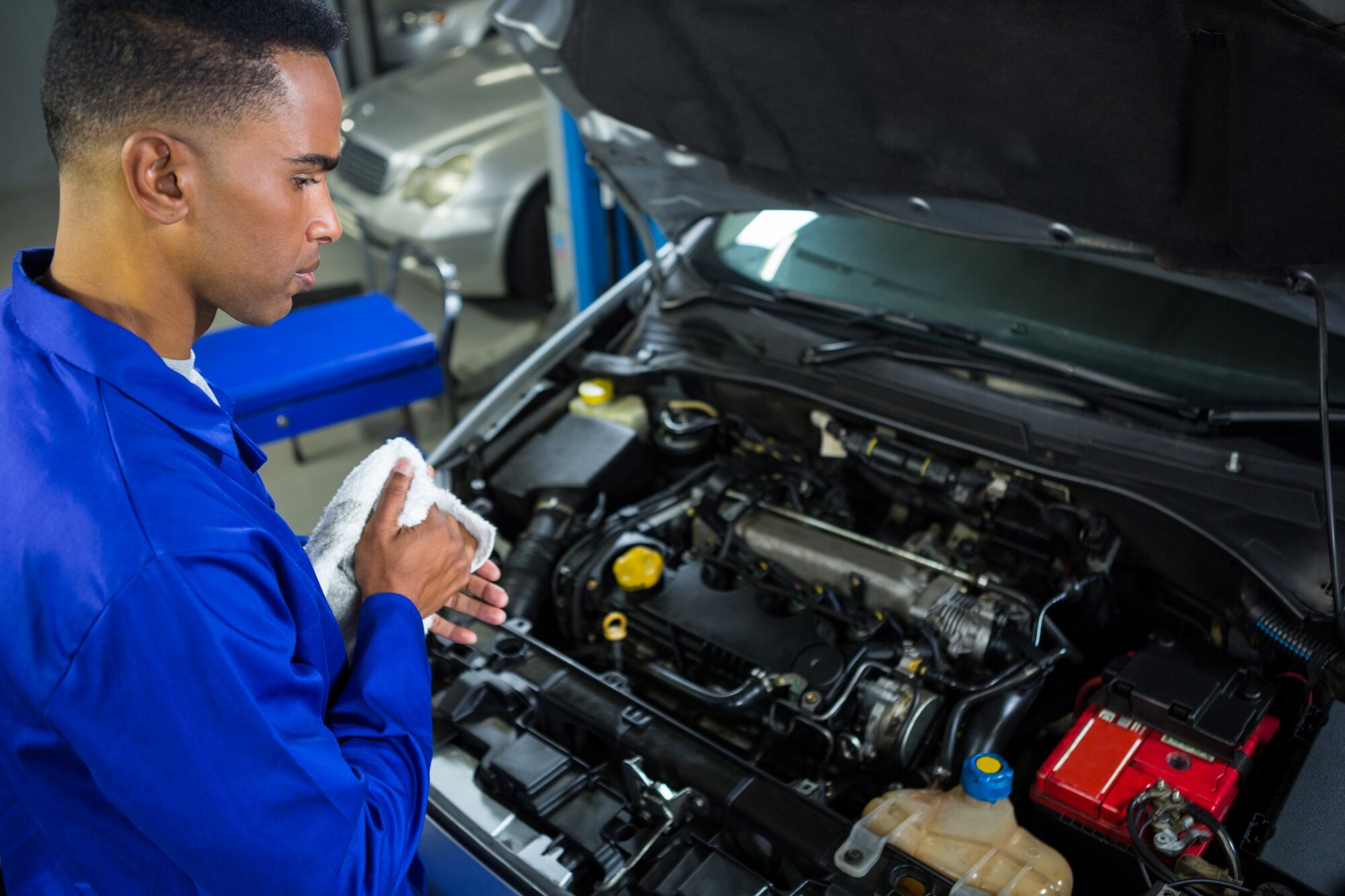 Xpress Oil & Lube Center Technician at Work